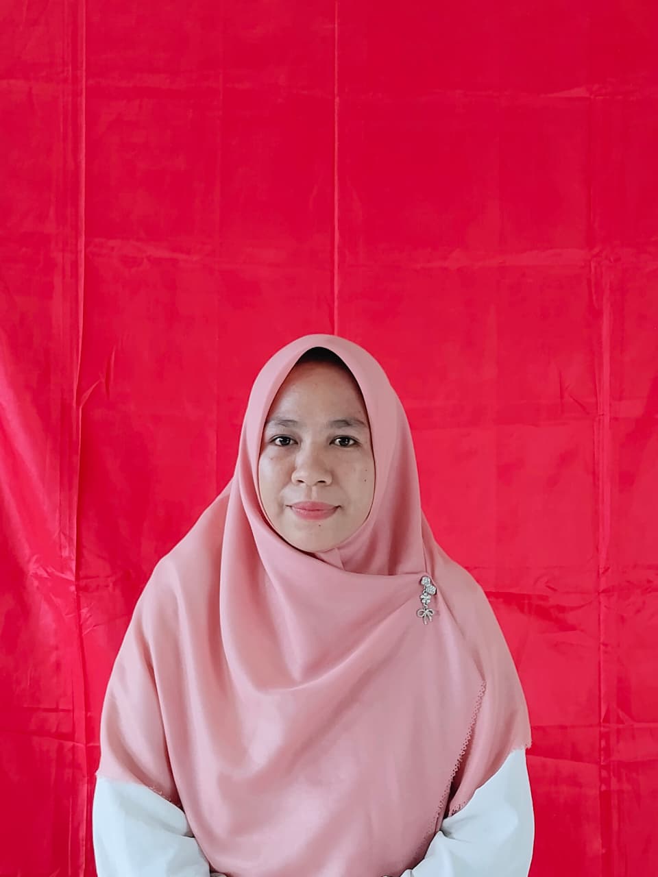 Intan Sarinia,S.Pd